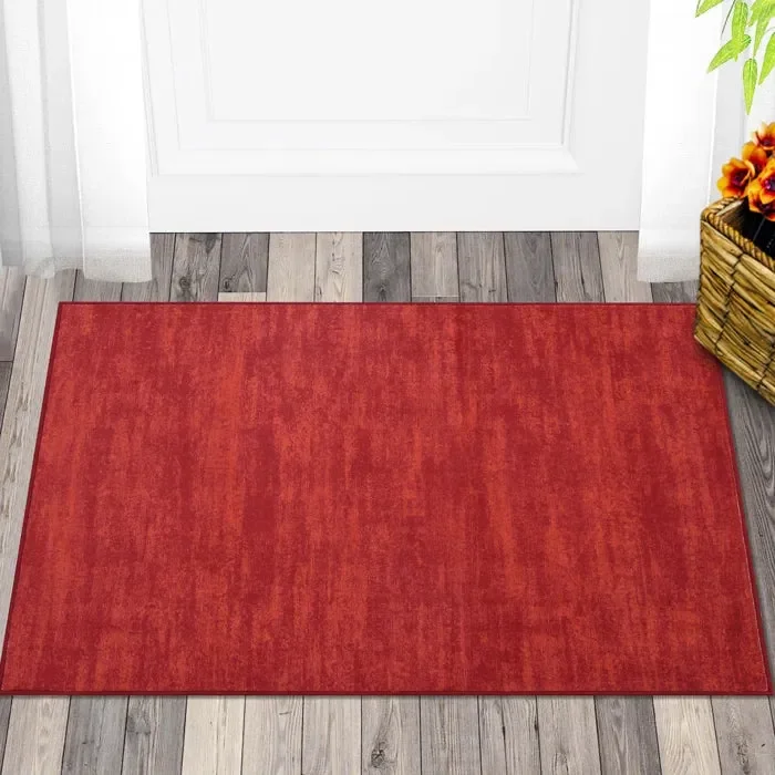 Ellicia Solid Color Polyester Area Rug in Red/Orange 2′ x 3′
