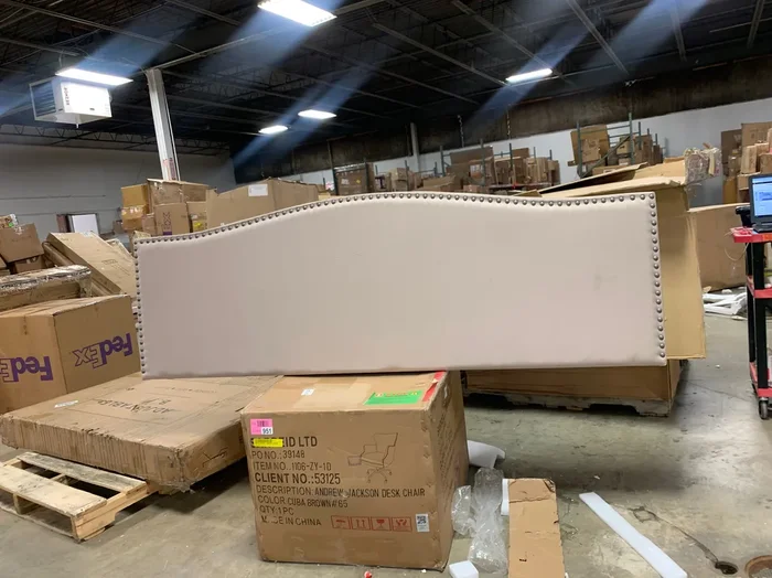 Lila Eastern King Upholstered Panel Bed